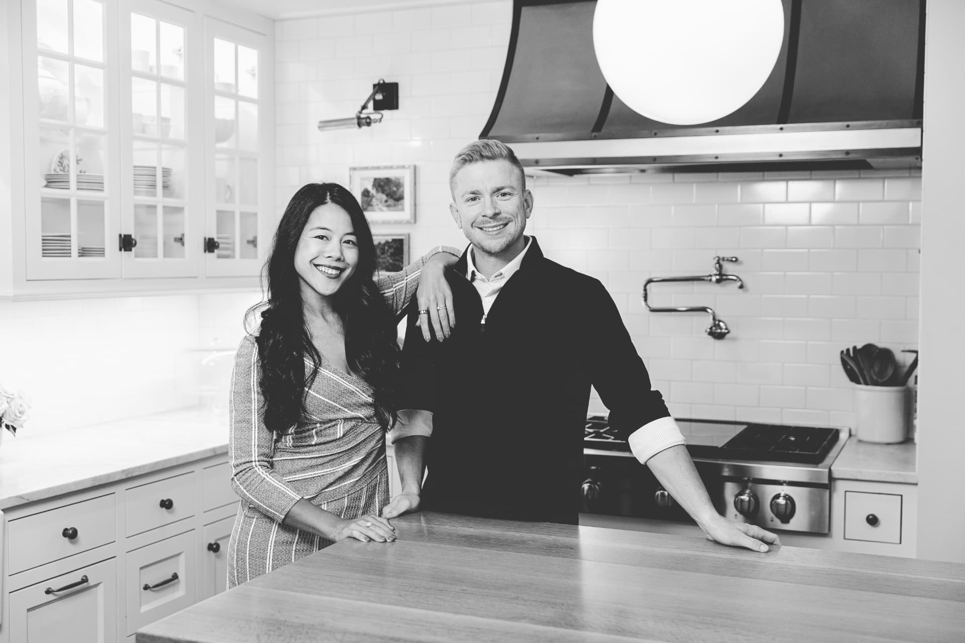 Katy and CJ Norman together in a kitchen